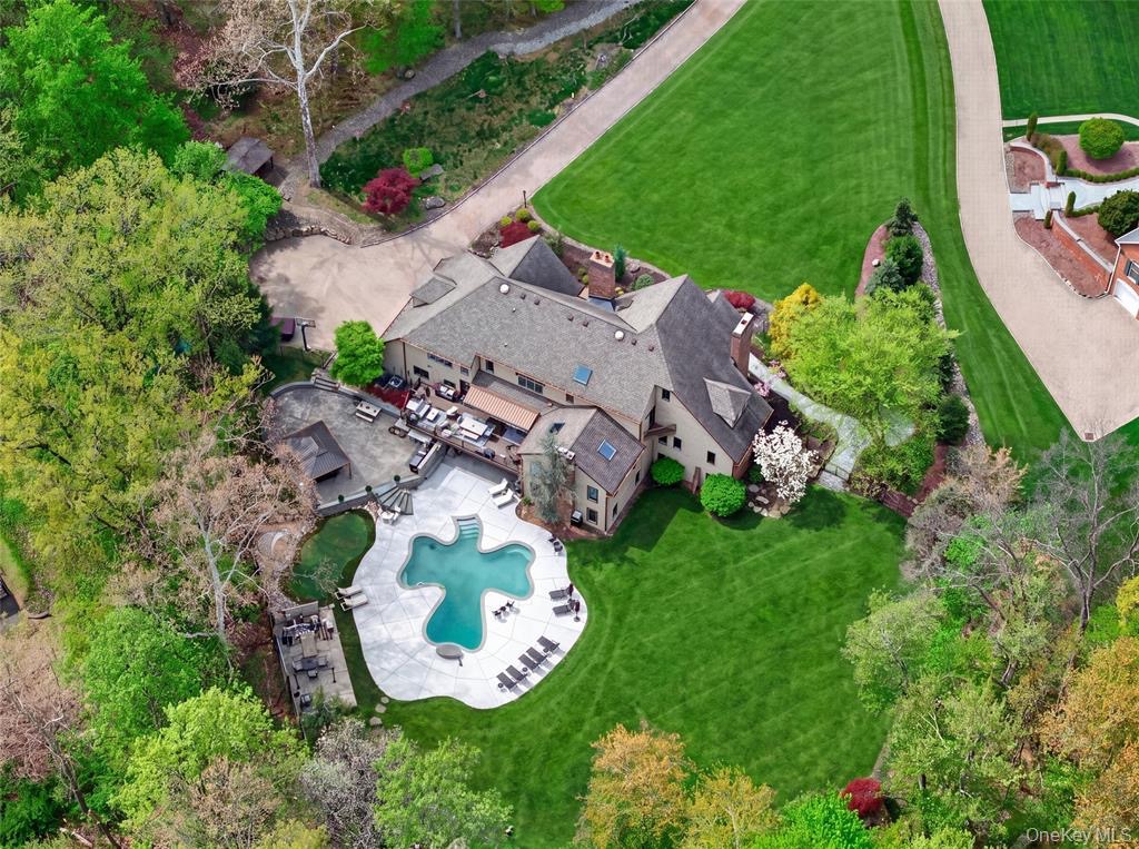 Aerial view of the estate, pool and landscaped grounds