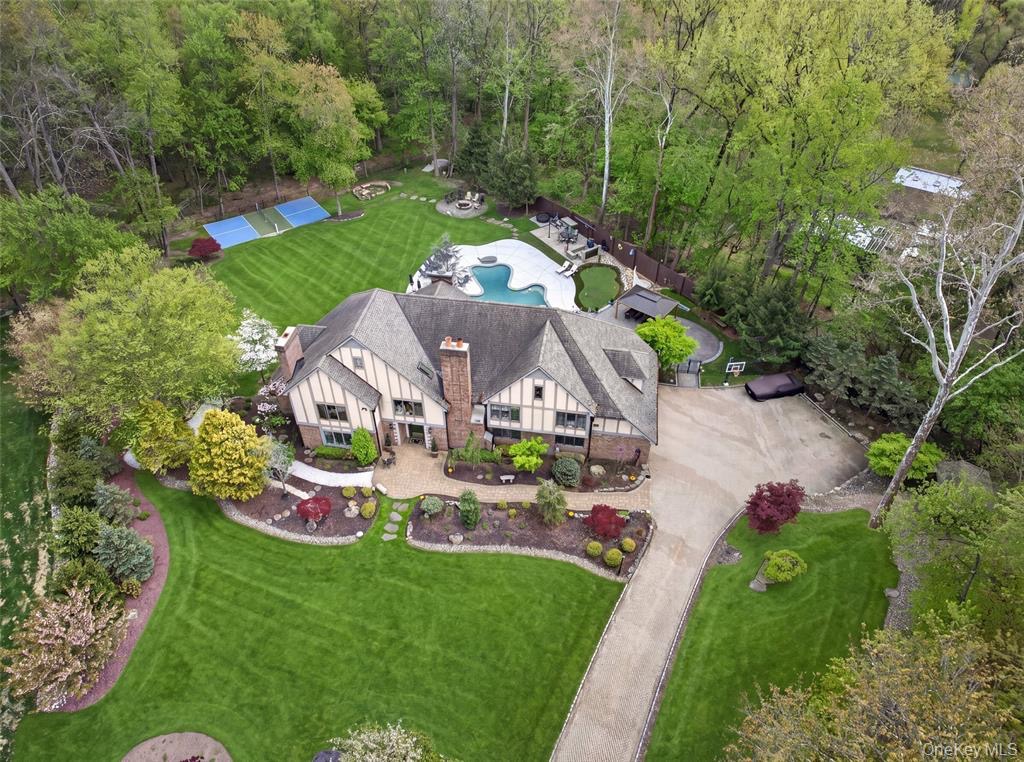 Aerial view of 4 Abbey Road and its landscaped property